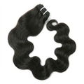 Black hair extensions with wavy texture on a white background